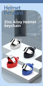 Detailed view of mini motorcycle helmet keychains with movable visors in four colors