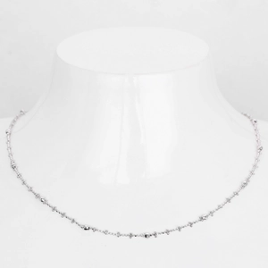 Detail of S925 sterling silver geometric chain necklace with tiny beaded accents