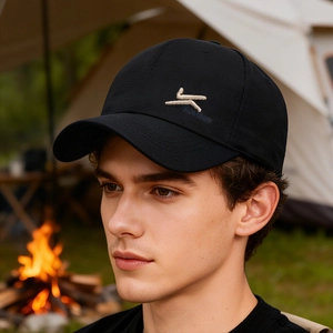 Outdoor portrait of black cotton baseball cap for men with KOMONT embroidery logo