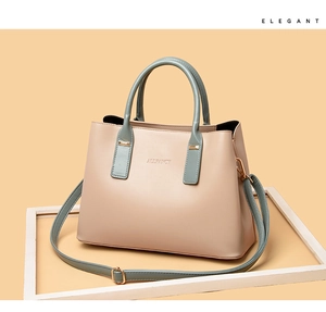 Elegant beige PU leather handbag featuring green handles and detachable shoulder strap
