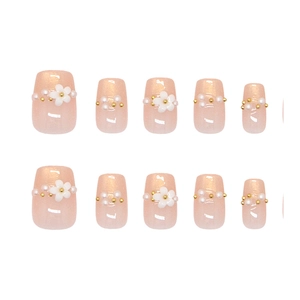Handmade cat-eye press-on nails with pearl flowers and pink shimmer in 10-piece set