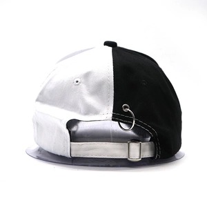 Hip-hop black and white baseball cap with signature silver ring and adjustable strap