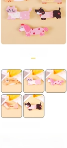 Detail view of various acrylic cartoon pet brooches featuring cat and dog designs