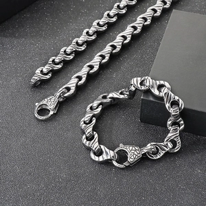 Detail of industrial punk stainless steel bracelet and necklace with textured links