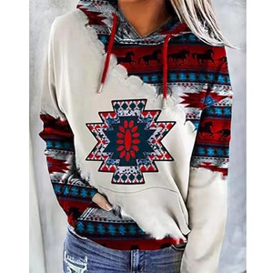 Detail of vintage tribal horse print on women's oversized hoodie with kangaroo pocket