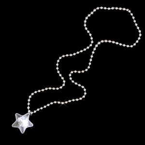 Detailed close-up of a silver bead chain with a transparent star-shaped resin pendant