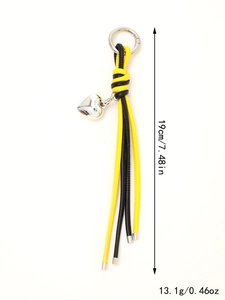 Detail view of black and yellow braided leather keychain with heart pendant and dimensions