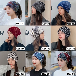 Multi-style paisley and geometric print cashmere-like neck gaiters and beanies shown in a grid