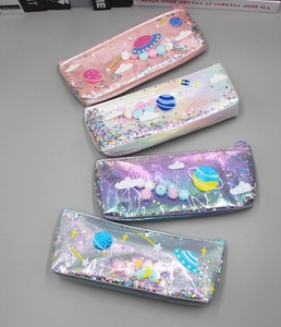 Detailed view of planetary space cosmetic bags with glitter liquid and plush ball decor