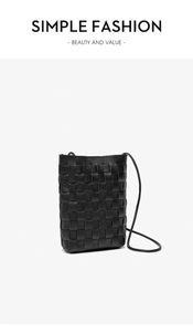 Detail of woven black leather texture on a vertical minimalist mobile phone bag