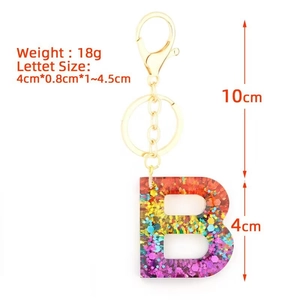 Detailed dimensions of rainbow glitter resin letter B keychain with gold hardware