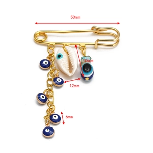 Detailed size specifications of gold Hamsa hand brooch with blue evil eye charms