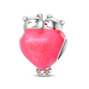 Detailed view of 925 silver charm featuring pink hugging bears and heart enamel detail