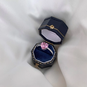 Elegant S925 sterling silver ring with pink heart gemstone and pavé diamonds in a box