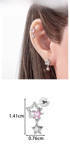 Detailed view of star-shaped cartilage stud with pink zircon and screw-back ball closure
