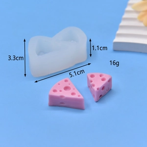 Detail view of triangle cheese silicone mold with product dimensions and sample cast