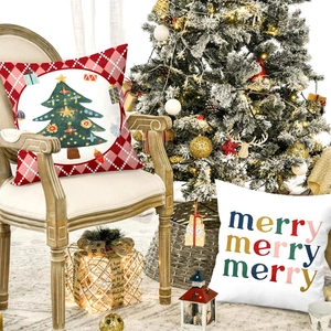 Christmas nutcracker pillow covers with red plaid patterns in a cozy holiday living room setting