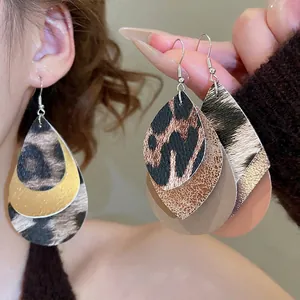 Retro leopard print faux leather layered teardrop earrings with a bohemian aesthetic