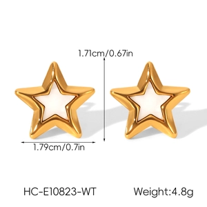 Detail view of gold star earrings with white enamel including size and weight measurements