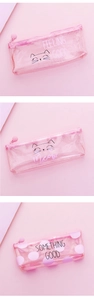 Detailed view of three pink glitter semi-transparent PVC cat pencil cases with slogans