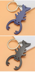 Detailed view of creative lobster-shaped metal keychains in blue and black alloy finishes