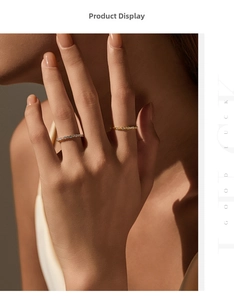 Close-up of elegant gold and silver S925 sterling silver rings with micro-pave diamonds