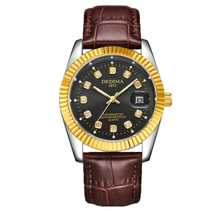 Luminous quartz watch with gold dial markers and a brown crocodile leather strap