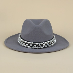 Detail of the gray wool fedora featuring a black ribbon band adorned with white pearls