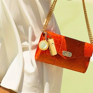 Orange crocodile pattern lipstick bag keychain with gold chain and round mirror charm
