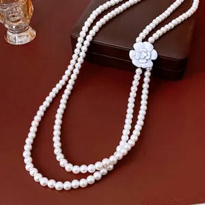Double-layer glass pearl necklace with white camellia flower pendant in vintage style