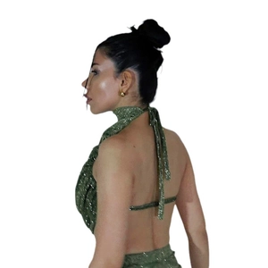 Elegant green sequin halter neck backless maxi dress with a shimmering metallic finish