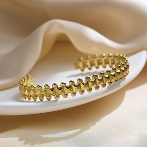 18k gold plated stainless steel C-shaped cuff bracelet with pyramid stud texture
