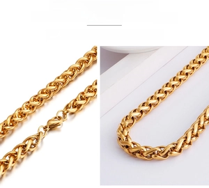 Detail of rust-resistant gold wheat chain necklace featuring a durable lobster clasp