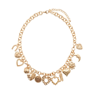 Gold chunky chain charm necklace with heart, moon, and boot pendants on white background