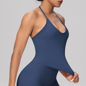 Detail of navy blue halter yoga top showing high elasticity fabric and snug athletic fit