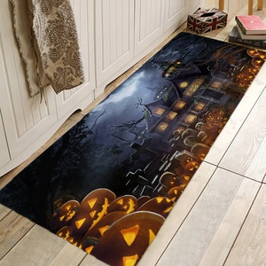 Halloween floor mat with glowing pumpkins and spooky house design on wooden floor