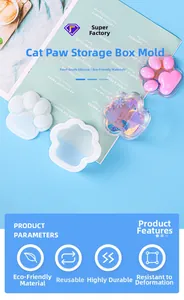 Detailed view of food-grade silicone cat paw storage box resin molds and finished pieces