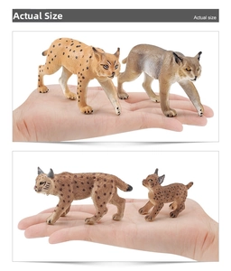 Hand holding realistic lynx animal figurines to demonstrate actual product size