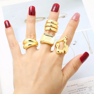 Set of four minimalist chunky 18k gold plated open rings with irregular textures