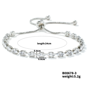 Detail view of adjustable silver bracelet with 0.4cm and 0.6cm sparkling clear gemstones
