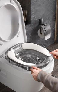 Detail of sitz bath basin with soft cushion on a modern toilet for postpartum care