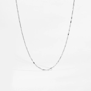 Detailed macro shot of a delicate S925 sterling silver twisted rope chain for women