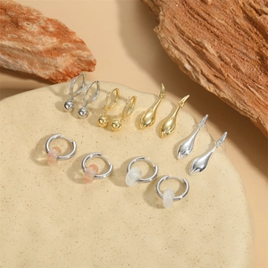 Collection of French vintage gold and silver drop earrings with beads and micro-set diamonds