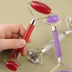 Dual-head facial roller massager set in red, purple and clear resin stone options