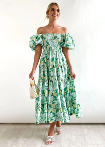 Close-up detail of tiered floral dress with puff sleeves and elastic off-shoulder neckline