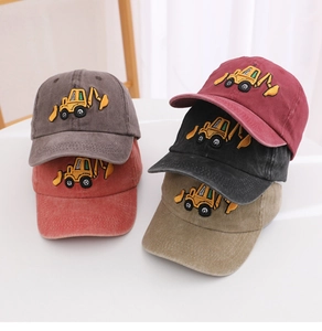 Close-up of embroidered yellow excavator pattern on washed cotton kids baseball caps