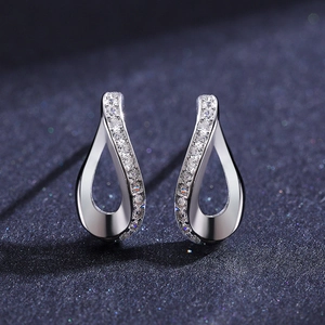 Elegant S925 sterling silver teardrop earrings with sparkling cubic zirconia on blue base