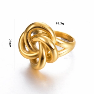 Polished gold knot ring detail showing 25mm height and 18.3g weight on white background