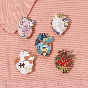 Detailed set of 5 artistic heart enamel pins featuring van gogh style and mushroom designs