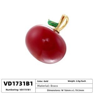 Detail view of cherry pendant made of brass and enamel with size and weight specs